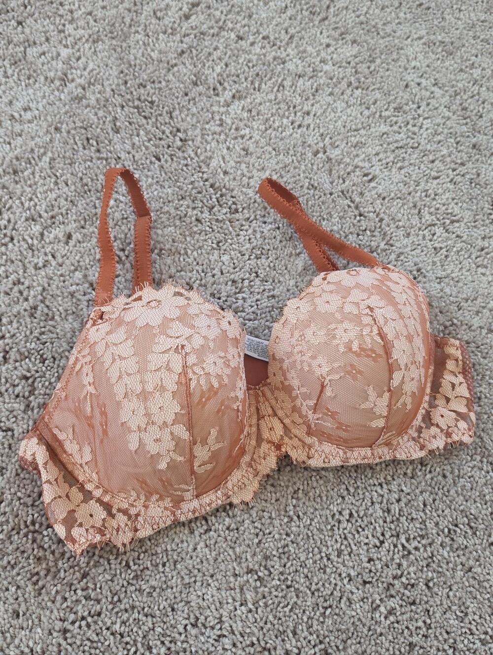 Victoria's Secret Dream Angel lined demi bra features an orange floral lace over
